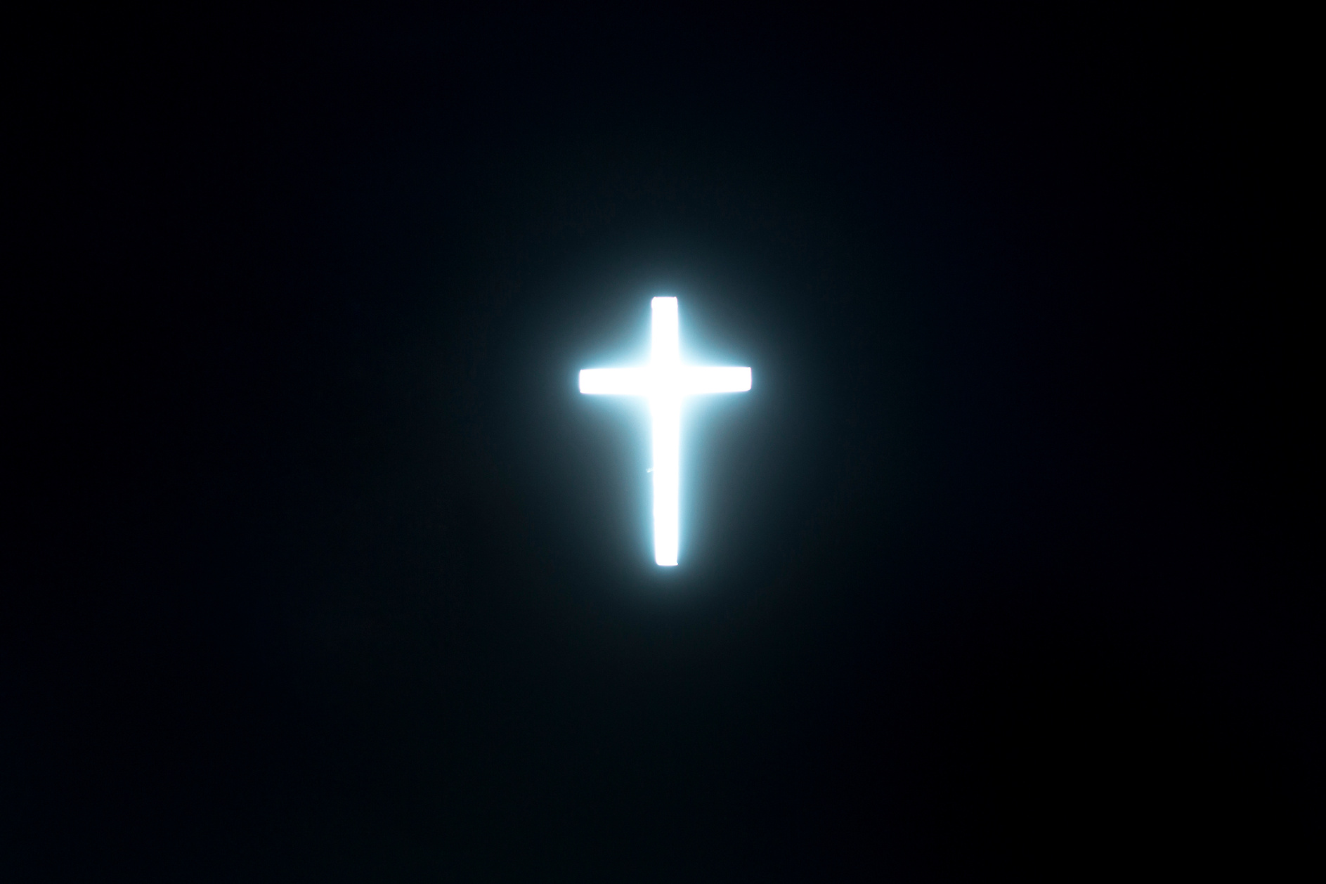 Bright Cross in Darkness